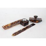 Faux tortoiseshell desk set comprising of pen tray, letter opener, inkwell and blotter (4)