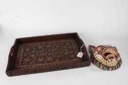 Middle Eastern hardwood tray, of rectangular form with pierced carrying handles and carved foliate