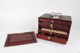 Chinese Mah-Jong set, housed within a hardwood and silvered metal mounted box, the sliding front