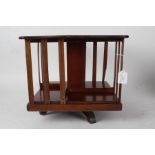 Edwardian mahogany table top revolving bookcase, 37cm square, 33cm high