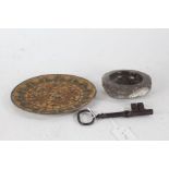 Lands End souvenir carved stone dish, 19th Century steel key, brass dish with foliate decoration (