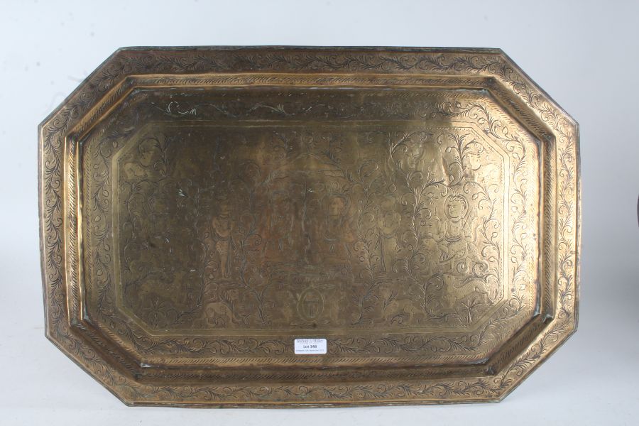 Middle Eastern brass temple tray, the central field with deity and animal decoration, with canted