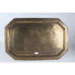 Middle Eastern brass temple tray, the central field with deity and animal decoration, with canted