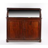 William IV mahogany chiffonier, the shelved gallery top above a mirror back and scroll arms above