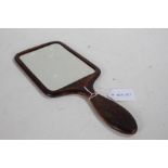 Late 19th/early 20th Century treen hand mirror, the back with a foliate design and monogram, 30.