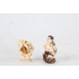 Two Japanese Meiji period carved ivory netsuke, the first in the form of a man with fish, having