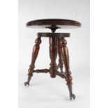 Late 19th century American beech piano stool, by Tonk of Chicago & New York, the revolving seat