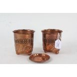 Pair of Joseph Sankey & Sons copper planters, with wavy rims above pierced, central bands and