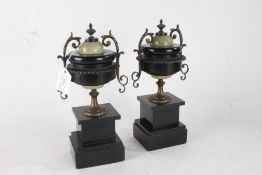 Pair of Edwardian onyx, slate and metal mounted garniture vases, with pierced scrolled handles to