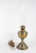 Victorian brass oil lamp, together with a kerosene lamp and a glass inkwell (3)