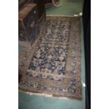 Middle Eastern style rug, the blue ground with lozenges and geometric motifs, 191cm x 105cm