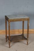 Empire style occasional table, with grey veined marble top, raised on tapering reeded legs united by