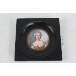 19th century hand painted miniature, depicting a lady wearing a yellow dress and holding a flower,
