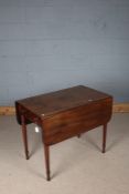 Victorian mahogany Pembroke table, with D shaped drop leaves and frieze drawer, raised on reeded