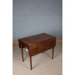 Victorian mahogany Pembroke table, with D shaped drop leaves and frieze drawer, raised on reeded