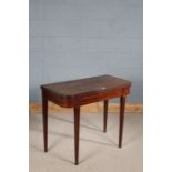 George III mahogany and boxwood tea table, the rectangular hinged top with round corners and