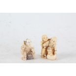 Two Japanese Meiji period carved ivory netsuke, the first in the form of street vendor holding fish,