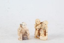 Two Japanese Meiji period carved ivory netsuke, the first in the form of street vendor holding fish,