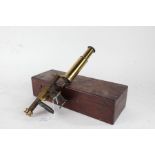 19th century brass microscope (unnamed), having mahogany box base, the box 35cm wide