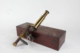 19th century brass microscope (unnamed), having mahogany box base, the box 35cm wide