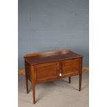 Edwardian mahogany, ebony and boxwood strung washstand, with shaped upstand above two panelled