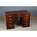 Military interest early 20th Century mahogany pedestal desk, the rectangular top with a tooled red