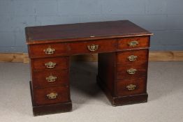 Military interest early 20th Century mahogany pedestal desk, the rectangular top with a tooled red