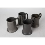 Three pewter pint tankards, pewter half pint tankard in the form of a pint tankard (4)