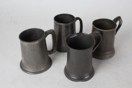 Three pewter pint tankards, pewter half pint tankard in the form of a pint tankard (4)