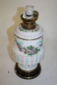 Victorian porcelain oil lamp (converted to electricity), the lift out font above a lattice body