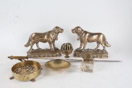 Pair of brass ornaments, each in the form of St Bernards, with registration numbers 50426.