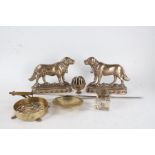 Pair of brass ornaments, each in the form of St Bernards, with registration numbers 50426.