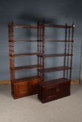 Pair of Oriental inspired open bookcases, each with four shelves on bamboo effect supports, the