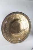 Indian Benares brass tray, with pierced foliate decoration and centred with a bird, 59cm diameter