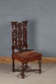 18th Century style chair, with a arched top rail above a stuff over seat and fluted cup supports,