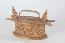 Scandinavian food box and cover, with scroll and foliate carved decoration, 21cm wide