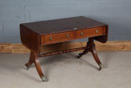 Regency style mahogany low sofa table, the rectangular banded top with D ends, above two frieze