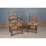 Elm ladderback elbow chair, with rush seat, similar dining chair, both on turned legs and stretchers