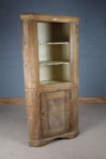 Victorian pine standing corner cupboard, the down-swept pediment above two white painted shaped