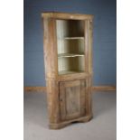 Victorian pine standing corner cupboard, the down-swept pediment above two white painted shaped