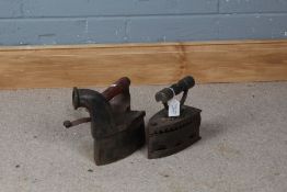 Two late 19th/ early 20th century iron boxes, each with wooden handles (2)