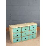 Set of scratch built blue and white painted bank of drawers, fitted nine drawers, 98cm long x 56cm