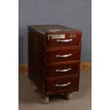 Set of portable bank drawers/till, fitted with four drawers and raised on four large wheels, 43cm