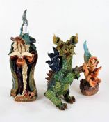 Three Coven of Witches pottery figures, to include a witch, wizard and dragon. the tallest 50cm (3)