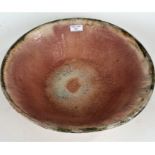 Large 20th century studio pottery bowl, the interior bowl with running glazes, painted initials JB