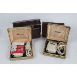 Six brown leather cased gentleman's vanity travelling sets, together with two Ronson electric