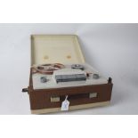 1960's/70's reel to reel tape player, housed within a carrying case, 35cm wide