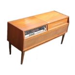 mid 20th Century Radiogram with turntable, 110cm wide, together with a collection of LPs and Tapes.