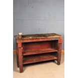 Rustic red painted work bench, with attached vice and two shelves below, 114cm long x 81cm high x