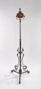 W.A.S. Benson style floor standing oil lamp, the copper reservoir above a steel stand with